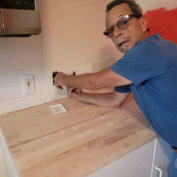 Knight Hands Remodeling a Kitchen